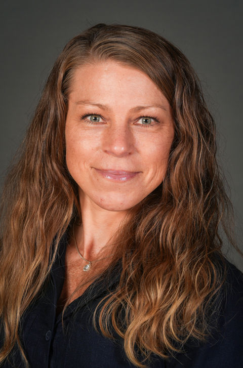 en person med langt hår